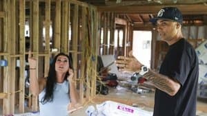 House Held Up by Car Jacks